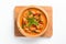 Top View, Red Curry On A Wooden Boardon White Background