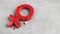 Top view red gender female symbol cracked on concrete floor. Concept is heartbroken, sexual, divorce, conflict, relationship