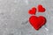 Top view of red hearts on cement background with copy space. Romantic concept. Valentine`s day concept