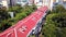 Top view of red roof of multi-storey residential building. Stock footage. Top view of red roof of multi-storey