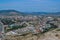top view of resort green town on shore of Black Sea bay among mountains and rocks