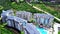 Top view of resorts with hotels and swimming pools. Clip. Beautiful complex hotels for summer holidays and recreation