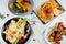 Top view of a restaurant table with delicious gourmet foods