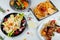 Top view of a restaurant table with delicious gourmet foods