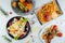 Top view of a restaurant table with delicious gourmet foods