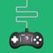 Top view of retro controller of old game console on green background.