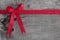 Top view of ribbon decoration on wooden background for christmas