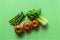 Top view of ripe tomatoes with asparagus and bok choy on the table