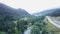 Top view of the river in a small settlement. Mountain countryside small houses in the village beautiful nature and