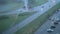 Top view, road in the city with cars during rain and thunderstorm