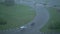 Top view, road in the city with cars during rain and thunderstorm