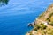 Top view of rocks and cliffs coastline of Riviera di Levante of National park Cinque Terre