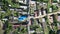 Top view of the roofs of houses in a small provincial town. Aerial view of houses in an expensive area. Buying real estate.