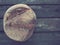 top view of round bread. Delicious fresh cornbread with sprinkles on an old wooden table. Copy space. Traditional