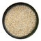 Top view of rye bran in round bowl isolated