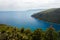 Top view of the sea strait or bay without boats and people from restaurant Vidicovac. Quiet, calm. Croatia, Plomin