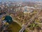 Top view on Secheni baths, Budapest city park. People are resting on the green grass. Lakes and bridge in the park. Spring.