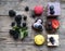 Top view of selection of colorful and delicious cake desserts on wooden table.