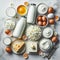 Top view of a series of dairy products on marble counter
