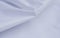 Top view of sharp White colored fabric, wrinkles