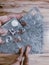 Top view shot of a female\'s hand holding a packaging of tablets - concept of new normal