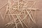 Top view shot of a heap of wooden toothpicks