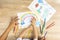 Top view shot of mother and daughter are drawing and coloring beautiful rainbow picture on paper together shows concept of art