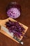 Top view shredded red cabbage with knife