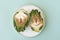 Top view Sliced artichoke on plate on green background. Healthy food vegetables.