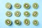 Top view of sliced kiwis on blue background