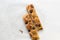 top view of sliced olive and onion focaccia on a white background, Flatlay of focaccia with black olives and red onion topping