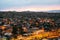 Top view. A small authentic city called Goreme in Cappadocia in Turkey in the evening. Dramatic night sky, sunset.