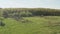 Top view of a small Russian village. Rural landscape. Field and village. A half-abandoned village. Bet onny foundations