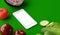 Top view of smartphone with blank screen and fresh raw vegetables on wooden table. 3D illustration