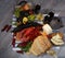 Top view of smoked sturgeon, crustaceans, fruits and wine