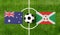 Top view soccer ball with Australia vs. Burundi flags match on green football field