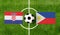 Top view soccer ball with Croatia vs. Philippines flags match on green football field