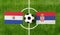 Top view soccer ball with Paraguay vs. Serbia flags match on green football field