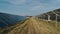 Top view of specialists walking across a solar power plant. Three employees of alternative power plant walking and