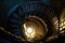 top view of a spiral staircase with contrasting shadows