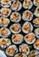 Top view of stack of Japanese sushi maki roll plate.