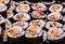 Top view of stack of Japanese sushi maki roll plate