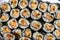 Top view of stack of Japanese sushi maki roll plate.