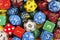 Top view on a stack of role playing game dice as abstract background.