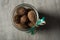 top view on standard open glass jar filled with whole walnuts