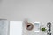Top view of stationery and telephone, coffee on grey desktop ba