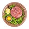 Top view of Steak tartare portion on brown plate