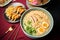 Top view of steaming hot Japanese dishes ready to serve