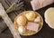 Top view still life of various bath products in wood wicker basket. Bath bomb  bar of soap  natural sea sponge with mother pear se