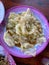 Top view Stir-fried cauliflower in fish sauce with oyster sauce, Asian food on a tableware plate.